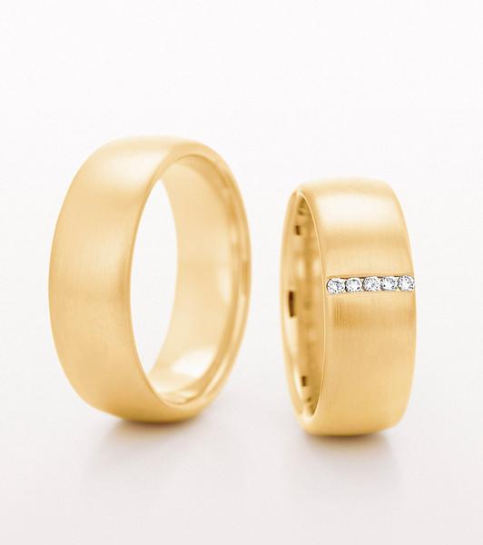 14K YELLOW GOLD SATIN WEDDING RING WITH DIAMONDS SET IN CENTER 75MM - RING ON RIGHT