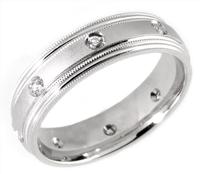 14K GOLD AND DIAMOMD WEDDING RING WITH MILLGRAIN EDGES 7MM