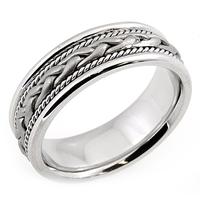 14KT WEDDING RING WITH BRAID IN CENTER AND TWISTS ON SIDES